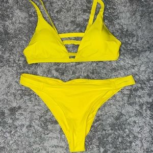 Size L yellow bikini. Never worn